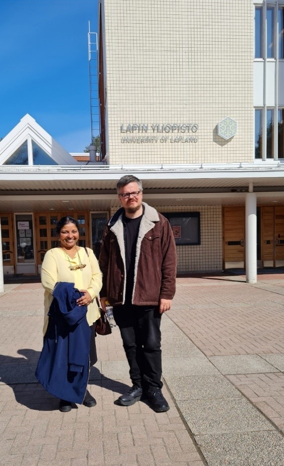 Kalpana and Knút outside the University of Lapland